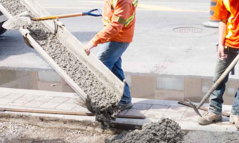 Guys working on a new concrete driveway in bay of plenty